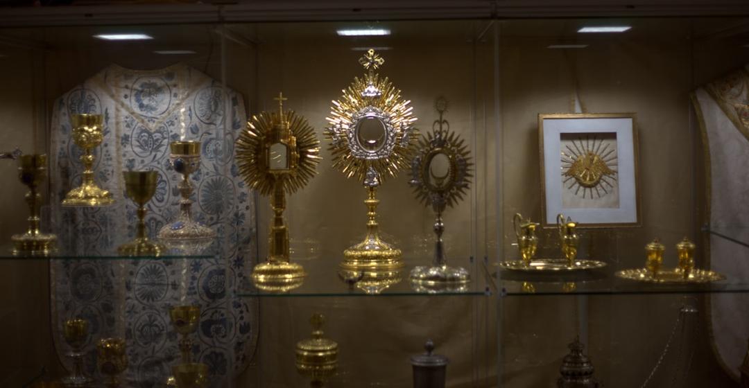 Sacred religious artifacts and reliquaries displayed in a museum collection