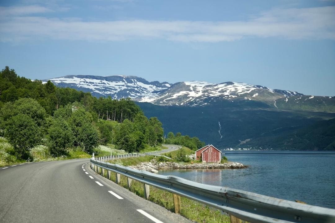 Hikers on St. Olav's Way pilgrimage route through the Norwegian countryside